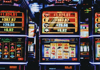 Colorful icons representing different game categories like rummy and slots.
